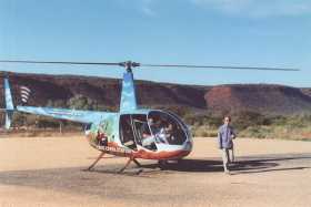 Heather alights from our Gill Ranges helicopter tour