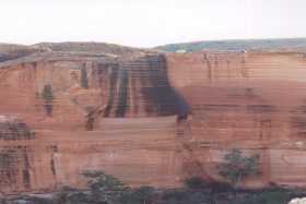 Massive sheer walls form the canyon