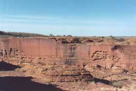 Massive sheer walls form the canyon