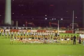 The teams line up at the MCG