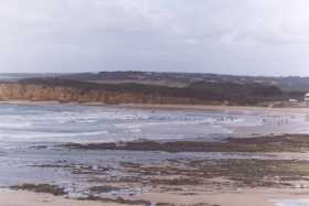 Surfers at Jan Juc beach at Torquay on the Great Ocean Road