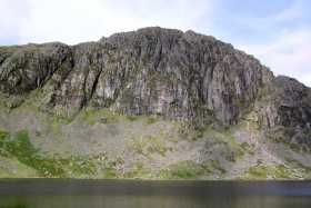 Pavey Ark towers over Stickle Tarn Pavey Ark towers over Stickle Tarn