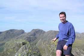 Mike on top of Bow Fell Mike on top of Bow Fell